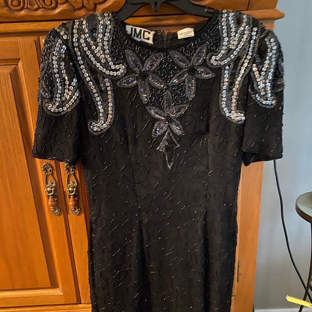 Elegant black sequined dress. Small